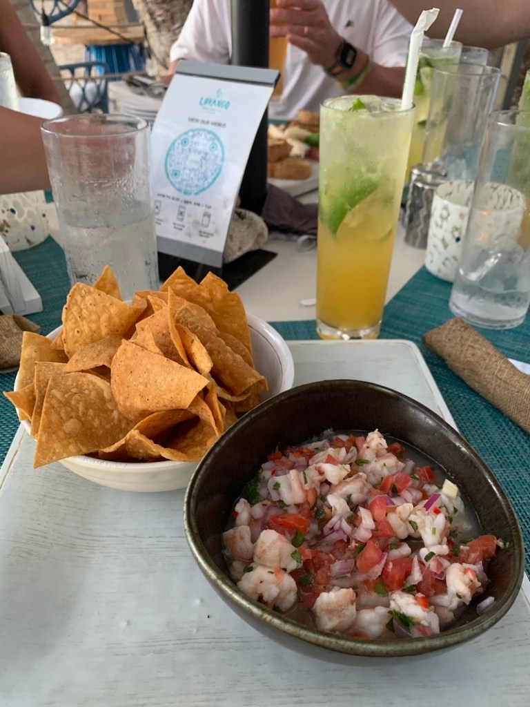 Pink shrimp ceviche and passion fruit mojito at Lovango